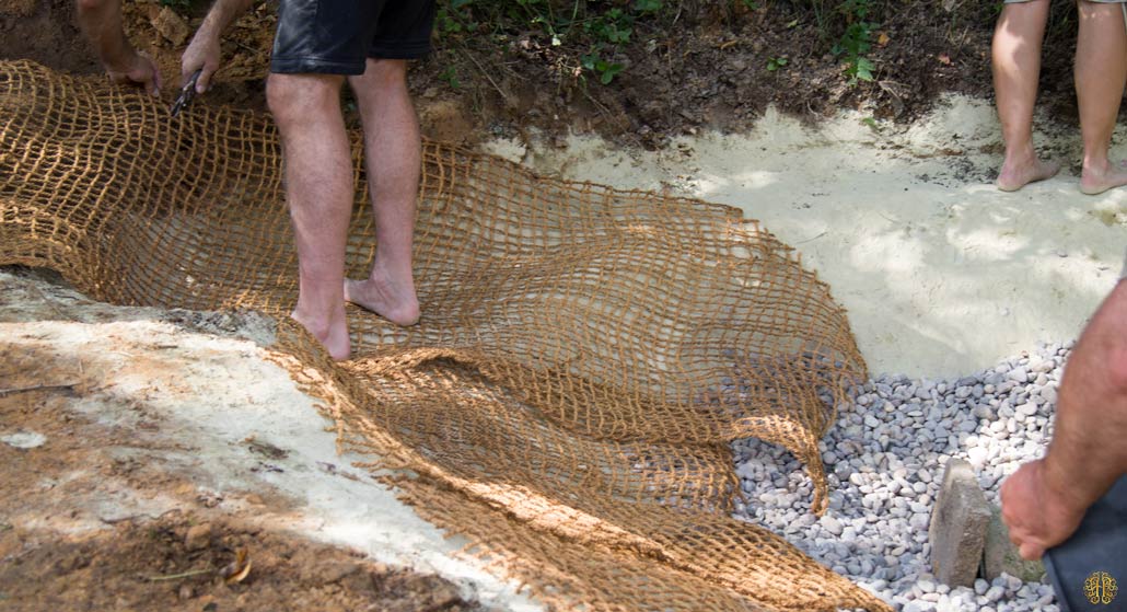 Coconut fiber mats to stabilize the edges of the natural pond - hyperbrain.me